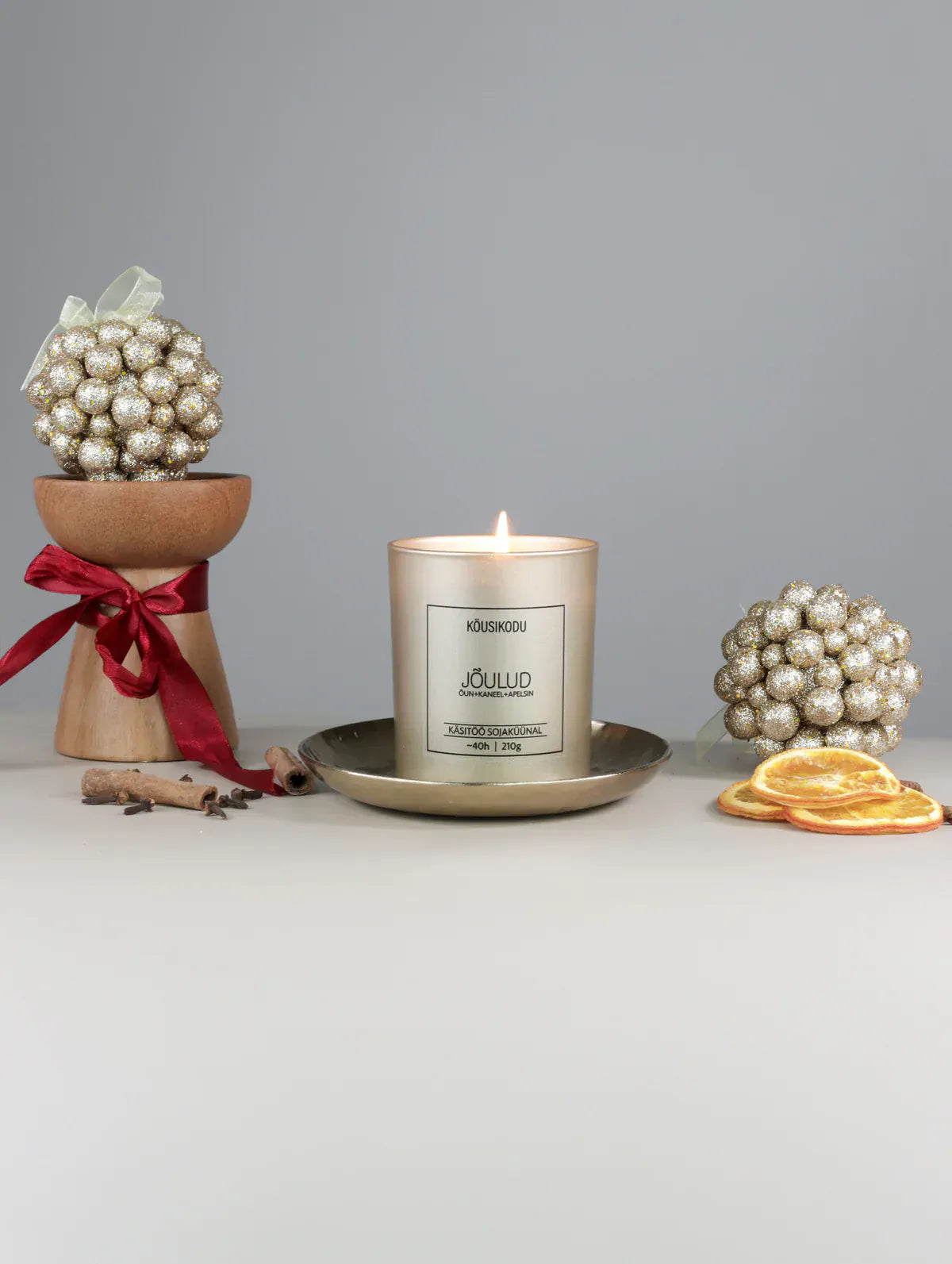 Villem Köusikodu sojaküünal “Jõulud" kuldses klaasis Köusikodu